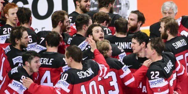 Players of team Canada celebrate after winning the gold medal match Canada vs Russia at the 2015 IIHF Ice Hockey World Championships on May 17, 2015 at the O2 Arena in Prague. Olympic champions Canada won the ice hockey world championship after sweeping defending champions Russia 6-1 in the final. AFP PHOTO / JONATHAN NACKSTRAND (Photo credit should read JONATHAN NACKSTRAND/AFP/Getty Images)