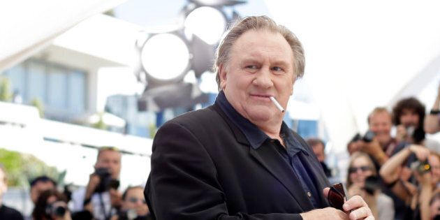 Actor Gerard Depardieu poses for photographers during a photo call for the film Valley of Love, at the 68th international film festival, Cannes, southern France, Friday, May 22, 2015. (AP Photo/Thibault Camus)
