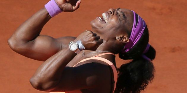 Serena Williams of the U.S. celebrates winning the final of the French Open tennis tournament against Lucie Safarova of the Czech Republic in three sets, 6-3, 6-7, 6-2, at the Roland Garros stadium, in Paris, France, Saturday, June 6, 2015. (AP Photo/David Vincent)