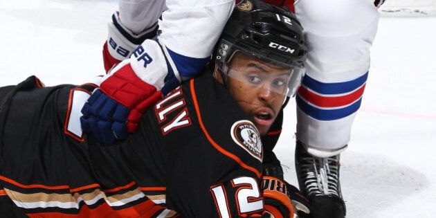ANAHEIM, CA - JANUARY 7: Devante Smith-Pelly #12 of the Anaheim Ducks lies on the ice during a game against the New York Rangers on January 7, 2015 at Honda Center in Anaheim, California. (Photo by Debora Robinson/NHLI via Getty Images)