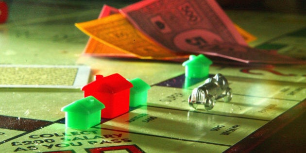 GLASGOW, SCOTLAND - AUGUST 5: Houses adorn a famous London street on a Monopoly board August 5, 2004, in the classic game of property dealing where the prices of property have never moved unlike the UK housing market, Glasgow, Scotland. Property owners in the UK are bracing themselves for a widely anticipated hike in the base rate of interest today as the Bank of England's Monetary Policy Committee moves to cool the housing market. (Photo Illustration by Christopher Furlong/Getty Images)