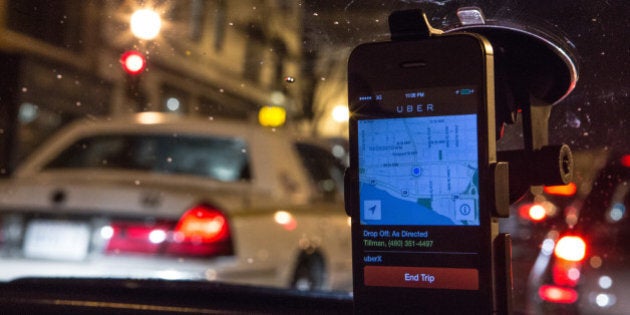 WASHINGTON, DC - APR 4: UberX driver, Regan Rucker, drives a customer home, April 4, 2014, in Washington, DC. (Note -- That is not the real phone number of customer Tilman, Uber uses a security system that uses dummy phone number so neither drivers nor passengers have each others real phone numbers.) Rucker, a single mom who recently started driving for UberX, likes the flexibility of UberX because she can work whenever and however long she wants.Thousands of local car owners have signed up in recent months to drive with one of the 'ride-share' operators that use smartphone apps to link people needing rides with car owners willing to give them, for a price. (Photo by Evelyn Hockstein/For The Washington Post via Getty Images)