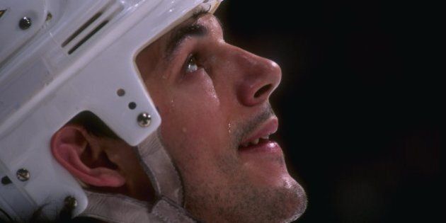 29 Feb 1996: Leftwinger Gino Odjick of the Vancouver Canucks looks on during a game against the St. Louis Blues at General Motors Place in Vancouver, British Columbia. The game was a tie, 2-2. Mandatory Credit: Glenn Cratty /Allsport