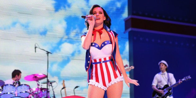 WASHINGTON, DC - JANUARY 19: The musician Katy Perry sings during the children's concert at the Washington Convention Center to celebrate military families on January 19, 2013 in Washington, DC. The U.S. capital is preparing for the second inauguration of U.S. President Barack Obama, which will take place on January 21. (Photo by Joe Raedle/Getty Images)