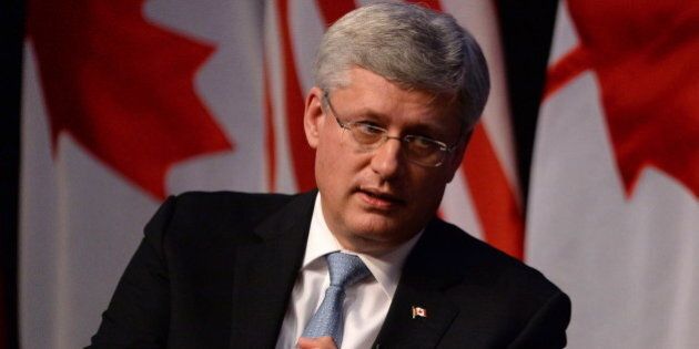 Prime Minister Stephen Harper takes part in a question and answer session at Goldman and Sachs in New York on Wednesday, September 24, 2014. THE CANADIAN PRESS/Sean Kilpatrick