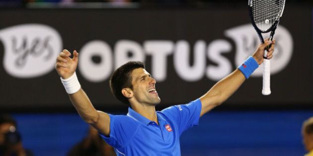 MELBOURNE, AUSTRALIA - FEBRUARY 01: Novak Djokovic of Serbia celebrates winning championship point in his men's final match against Andy Murray of Great Britain during day 14 of the 2015 Australian Open at Melbourne Park on February 1, 2015 in Melbourne, Australia. (Photo by Clive Brunskill/Getty Images)