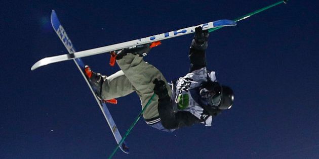 Canada's Simon d'Artois competes during the freestyle skiing superpipe final at the Dew Tour iON Mountain Championships, Saturday, Dec. 14, 2013, in Breckenridge, Colo. (AP Photo/Julie Jacobson)