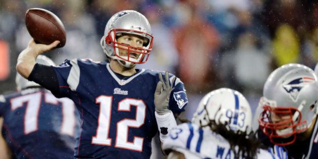 New England Patriots quarterback Tom Brady (12) passes against the Indianapolis Colts during the second half of the NFL football AFC Championship game Sunday, Jan. 18, 2015, in Foxborough, Mass. (AP Photo/Charles Krupa)