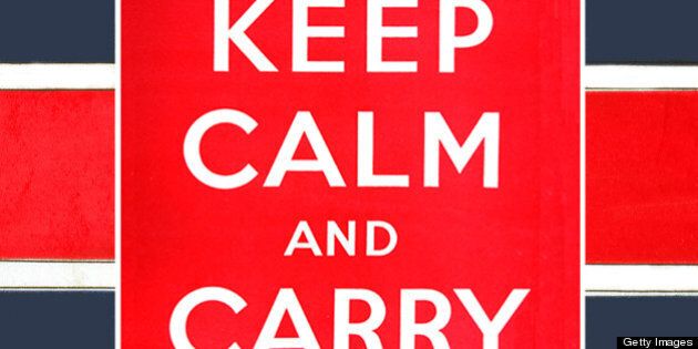 A poster produced by the British government in World War II, with the text 'Keep Calm And Carry On' on a background of the flag of British Guiana, circa 1939. (Photo by SSPL/National Archives/Getty Images)