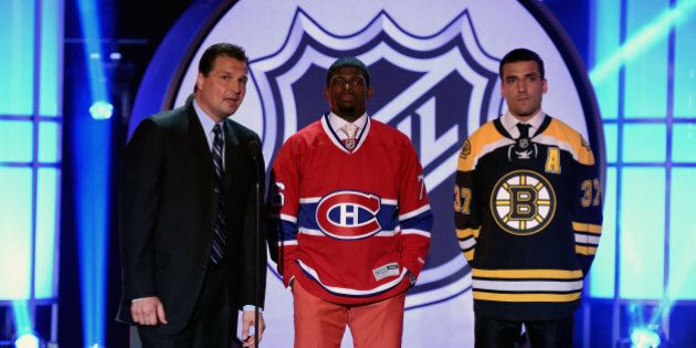 LAS VEGAS, NV - JUNE 24: (L-R) Broadcaster Eddie Olczyk speaks with P.K. Subban of the Montreal Canadiens and Patrice Bergeron of the Boston Bruins during the 2014 NHL Awards at the Encore Theater at Wynn Las Vegas on June 24, 2014 in Las Vegas, Nevada. (Photo by Ethan Miller/Getty Images)