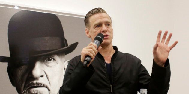 Canadian rock singer and photographer Bryan Adams speaks during the vernissage of his exhibition 'Bryan Adams Exposed' on June 18, 2013 at the Ostlich photo-gallery in Vienna. AFP PHOTO/DIETER NAGL (Photo credit should read DIETER NAGL/AFP/Getty Images)