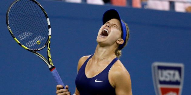 Eugenie Bouchard, of Canada, reacts after defeating Barbora Zahlavova Strycova, of the Czech Republic, during the third round of the U.S. Open tennis tournament Saturday, Aug. 30, 2014, in New York. Bouchard won 6-2, 6-7 (2), 6-4. (AP Photo/Elise Amendola)