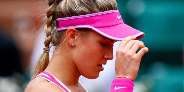 PARIS, FRANCE - MAY 26: Eugenie Bouchard of Canada reacts during her women's singles match against Kristina Mladenovic of France on day three of the 2015 French Open at Roland Garros on May 26, 2015 in Paris, France. (Photo by Julian Finney/Getty Images)