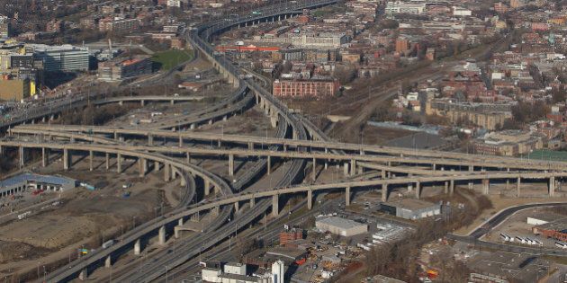 MONTREAL, QC - NOVEMBER 18: An aerial view of traffic on the Turcot Interchange and the Montreal skyline are seen from above on November 18, 2012 in Montreal, Quebec. (Photo by Tom Szczerbowski/Getty Images)