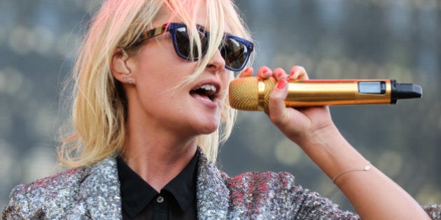 LOS ANGELES, CA - AUGUST 30: Vocalist Emily Haines of Metric performs during Day 1 of the Budweiser Made in America festival at Los Angeles Grand Park on August 30, 2014 in Los Angeles, California. (Photo by Chelsea Lauren/WireImage)