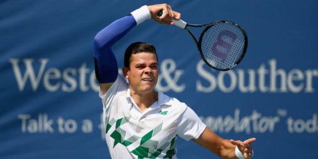 CINCINNATI, OH - AUGUST 14: Milos Raonic of Canada hits a return in the match against Steve Johnson on Day 6 at the Western & Southern Open on August 14, 2014 at the Linder Family Tennis Center in Cincinnati, Ohio. (Photo by Andy Lyons/Getty Images)