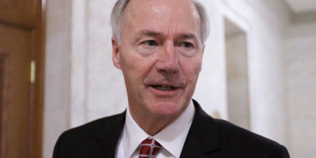 Arkansas Gov. Asa Hutchinson is interviewed in a hallway at the Arkansas state Capitol in Little Rock, Ark., Friday, Feb. 13, 2015. Hutchinson said he will not veto an anti-discrimination bill when it comes to his desk. (AP Photo/Danny Johnston)