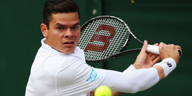 LONDON, ENGLAND - JUNE 26: Milos Raonic of Canada in action during his Gentlemen's Singles second round match against Jack Sock of the United States on day four of the Wimbledon Lawn Tennis Championships at the All England Lawn Tennis and Croquet Club at Wimbledon on June 26, 2014 in London, England. (Photo by Steve Bardens/Getty Images)