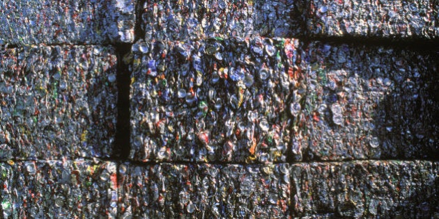 Recyclable materials include many kinds of glass, paper, metal, plastic, textiles, and electronics. Although similar in effect, the composting or other reuse of biodegradable waste-such as food or garden waste-is not typically considered recycling. Materials to be recycled are either brought to a collection center or picked up from the curbside, then sorted, cleaned, and reprocessed into new materials bound for manufacturing. Although many government programs are concentrated on recycling at home, a large portion of waste is generated by industry. The focus of many recycling programs done by industry is the cost-effectiveness of recycling. The ubiquitous nature of cardboard packaging makes cardboard a commonly recycled waste product by companies that deal heavily in packaged goods, like retail stores, warehouses, and distributors of goods. Other industries deal in niche or specialized products, depending on the nature of the waste materials that are present.