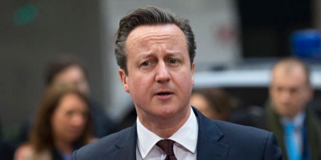 British Prime Minister David Cameron arrives for an EU summit in Brussels on Friday, March 20, 2015. EU leaders on Friday are looking to back U.N.-brokered efforts to form a national unity government in conflict-torn Libya that may include a possible mission to help provide security. (AP Photo/Francoise Mori)