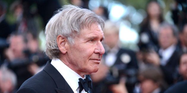 Harrison Ford arrives for the screening of The Homesman at the 67th international film festival, Cannes, southern France, Sunday, May 18, 2014. (Photo by Arthur Mola/Invision/AP)