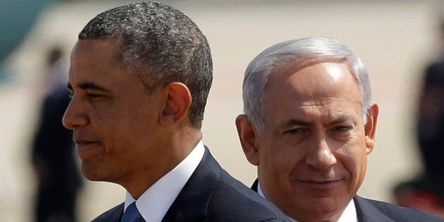 President Barack Obama, left, with Israeli Prime Minister Benjamin Netanyahu, right, during his arrival ceremony at Ben Gurion International Airport in Tel Aviv, Israel, Wednesday, March 20, 2013, (AP Photo/Pablo Martinez Monsivais)