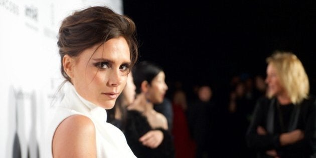 Victoria Beckham arrives at the inaugural amfAR Hong Kong gala on Saturday, March 14, 2015 in Hong Kong. (Photo by Ryan Emberley/Invision/AP)