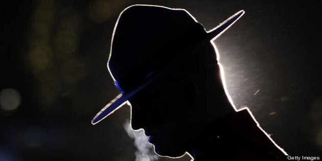 A Canadian mountie waits for the start of the medal ceremonies of the Vancouver Winter Olympics in Whistler on February 19, 2010. AFP PHOTO / FRANCK FIFE (Photo credit should read FRANCK FIFE/AFP/Getty Images)