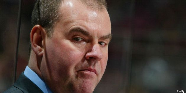 EAST RUTHERFORD, NJ - JANUARY 7: Pat Burns, head coach of the New Jersey Devils looks on against the Pittsburgh Penguins during their game at the Continental Airlines Arena on January 7, 2004 in East Rutherford, New Jersey. (Photo by Al Bello/Getty Images)