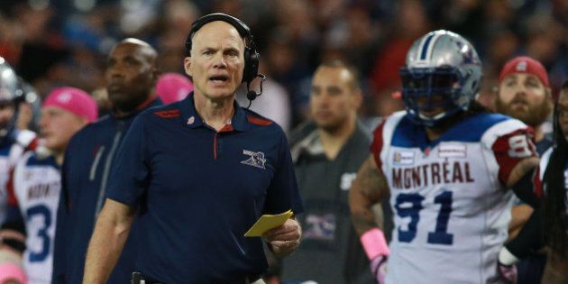 TORONTO, ON - OCTOBER 18: Head Coach Tom Higgins of the Montreal Alouettes looks on as his team faces the Toronto Argonauts during their game at Rogers Centre on October 18, 2014 in Toronto, Canada. (Photo by Dave Sandford/Getty Images)