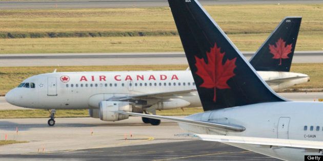 111103 File photo's of Air Canada jets, Jazz, Westjet, U.S Airways, ground personal unloading AC jet, fueling etc. (Dick Loek, Toronto Star) (Photo by Dick Loek/Toronto Star via Getty Images)