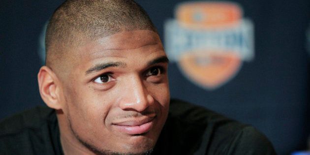FILE - In this Jan. 1, 2014, file photo, Missouri senior defensive lineman Michael Sam speaks to the media during an NCAA college football news conference in Irving, Texas. Sam says he is gay, and he could become the first openly homosexual player in the NFL. (AP Photo/Brandon Wade, File)
