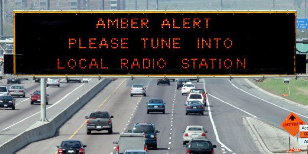 AMBER 1 / 05/14/05 -- Amber Alert is displayed on sign over westbound Highway 401 near Keele St. Police are hunting a man suspected of killing his estranged common-law wife and abducting their 2-year-old son. (Jim Wilkes/Toronto Star)jw (Photo by Jim Wilkes/Toronto Star via Getty Images)