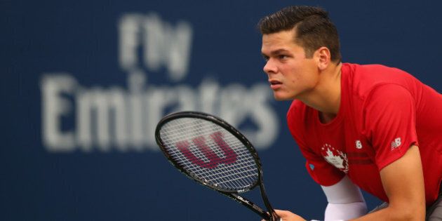 TORONTO, ON - AUGUST 07: Milos Raonic of Canada during play against Julien Benneteau of France during Rogers Cup at Rexall Centre at York University on August 7, 2014 in Toronto, Canada. (Photo by Ronald Martinez/Getty Images)