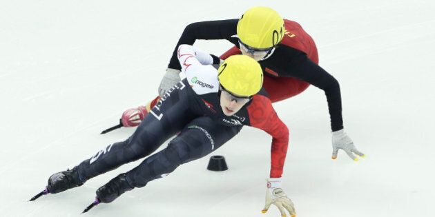 SHANGHAI, CHINA - DECEMBER 13: Marianna St-Gelais of Canada and Liu Yang of China compete in the Ladies 500M Quarterfinals during the ISU World Cup Short Track Speed Skating 2014/15 - Shanghai at Oriental Sports Center on December 13, 2014 in Shanghai, China. (Photo by Chung Sung-Jun - ISU/ISU via Getty Images)