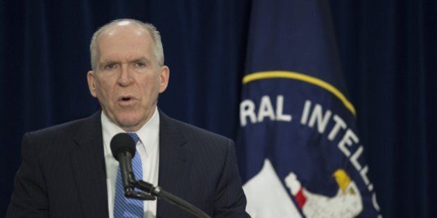 Director of Central Intelligence Agency John Brennan speaks to reporters during a press conference at CIA headquarters in Langley, Virginia, December 11, 2014. The head of the Central Intelligence Agency acknowledged Thursday some agency interrogators used 'abhorrent' unauthorized techniques in questioning terrorism suspects after the 9/11 attacks. CIA director John Brennan said there was no way to determine whether the methods used produced useful intelligence, but he strongly denied the CIA misled the public. AFP PHOTO/JIM WATSON (Photo credit should read JIM WATSON/AFP/Getty Images)