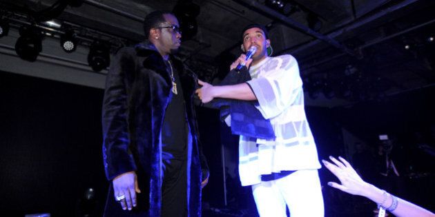 NEW YORK, NY - FEBRUARY 01: Sean 'Diddy' Combs and Drake perform at the Time Warner Cable Studios and Revolt Bring the Music Revolution event on February 1, 2014 in New York City. (Photo by Brad Barket/Getty Images for Time Warner Cable)