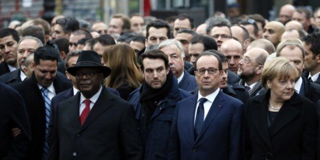 (From L) Israeli Prime Minister Benjamin Netanyahu, Malian President Ibrahim Boubacar Keita, a bodyguard, French President Francois Hollande, German Chancellor Angela Merkel and Palestinian president Mahmud Abbas take part in a Unity rally Marche Republicaine in Paris on January 11, 2015 in tribute to the 17 victims of a three-day killing spree by homegrown Islamists. The killings began on January 7 with an assault on the Charlie Hebdo satirical magazine in Paris that saw two brothers massacre 12 people including some of the country's best-known cartoonists, the killing of a policewoman and the storming of a Jewish supermarket on the eastern fringes of the capital which killed 4 local residents. AFP PHOTO / PATRICK KOVARIK (Photo credit should read PATRICK KOVARIK/AFP/Getty Images)