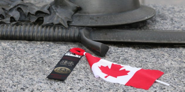 OTTAWA, ON - NOVEMBER 10:Poppies sit on the tomb of the Unknown Soldier as Preparations are under way War Memorial on the eve of Remembrance Day. (Steve Russell/Toronto Star via Getty Images)