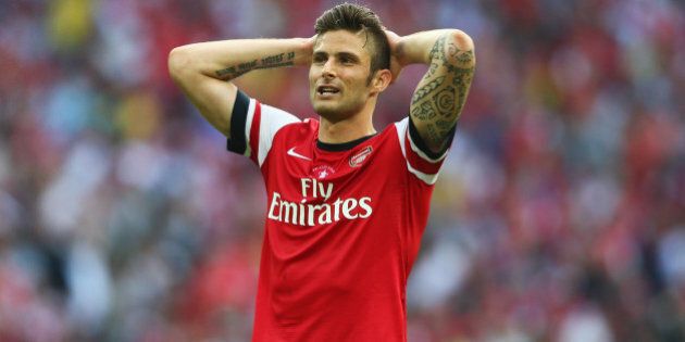 LONDON, ENGLAND - MAY 17: Olivier Giroud of Arsenal reacts during the FA Cup with Budweiser Final match between Arsenal and Hull City at Wembley Stadium on May 17, 2014 in London, England. (Photo by Paul Gilham/Getty Images)