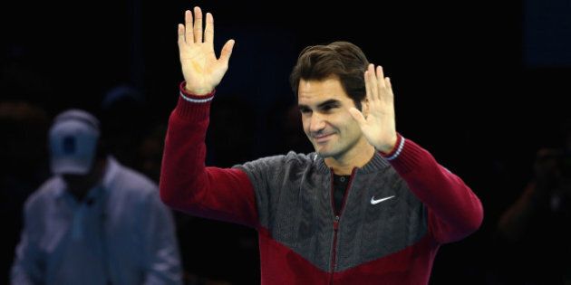 LONDON, ENGLAND - NOVEMBER 16: Roger Federer of Switzerland waves after announcing his decision to withdraw from the singles final match against Novak Djokovic of Serbia on day eight of the Barclays ATP World Tour Finals at O2 Arena on November 16, 2014 in London, England. (Photo by Clive Brunskill/Getty Images)