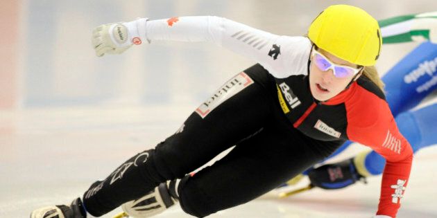 Winner Marianne St-Gelais of Canada competes during the 500 meter women's final race at the Short Track Speed Skating World Cup in Dresden, Sunday, Feb. 20, 2011. (AP Photo/Jens Meyer)