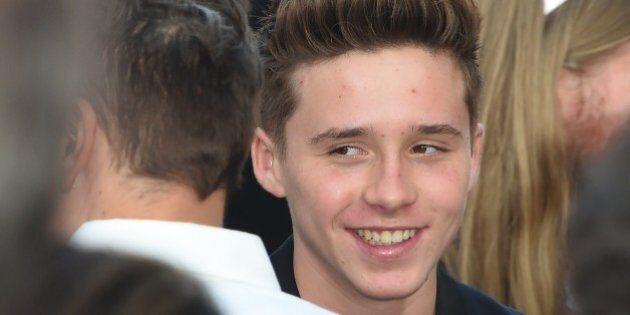 Brooklyn Beckham, son of Victoria Beckham and David Beckham, arrives for the premiere of New Line Cinemas and Metro-Goldwyn-Mayer Pictures If I Stay, August 20, 2014 at the TCL Chinese Theater in Hollywood California. AFP PHOTO / Robyn Beck (Photo credit should read ROBYN BECK/AFP/Getty Images)