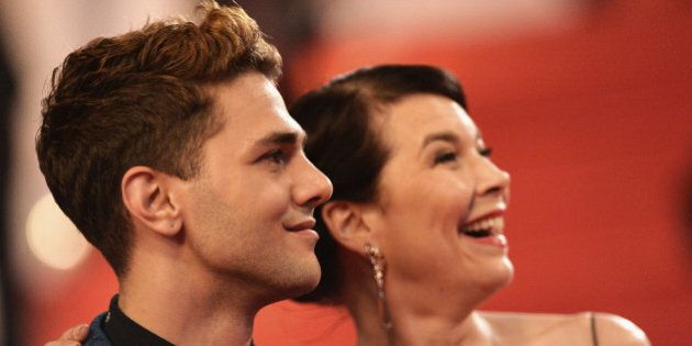 CANNES, FRANCE - MAY 22: Director Xavier Dolan and Anne Dorval attends the 'Mommy' premiere during the 67th Annual Cannes Film Festival on May 22, 2014 in Cannes, France. (Photo by Michael Buckner/Getty Images)