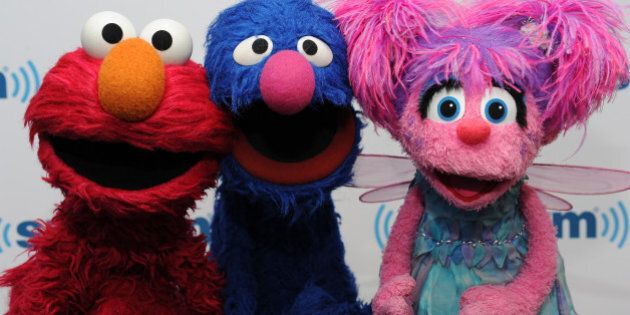 NEW YORK, NY - SEPTEMBER 12: (L-R) Elmo, Grover and Abby Cadabby of Sesame Street visit at SiriusXM Studios on September 12, 2014 in New York City. (Photo by Rommel Demano/Getty Images)