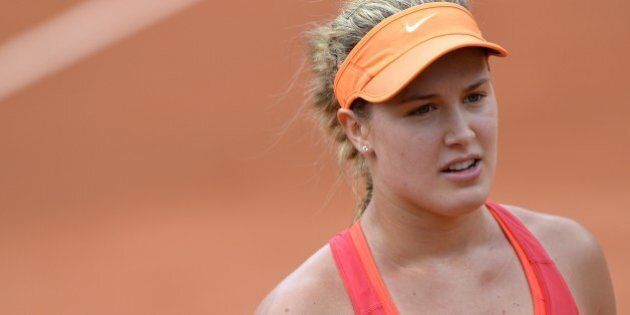 Canada's Eugenie Bouchard reacts during her French tennis Open quarter final match against Spain's Carla Suarez Navarro at the Roland Garros stadium in Paris on June 3, 2014. AFP PHOTO / MIGUEL MEDINA (Photo credit should read MIGUEL MEDINA/AFP/Getty Images)