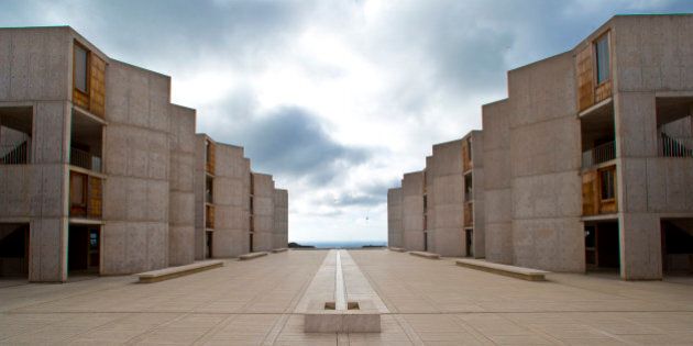 This Oct. 3, 2013 photo shows The Salk Institute, designed by world renowned architect Louis I. Kahn, above the Pacific Ocean and adjacent the glider port and the University of California San Diego in San Diego. The nationâs eighth-largest city has matured from its âFast Times at Ridgemont Highâ surf days. Today it boasts a burgeoning international art scene, thriving farm-to-table food movement, and a booming bio-tech industry. (AP Photo/Lenny Ignelzi)