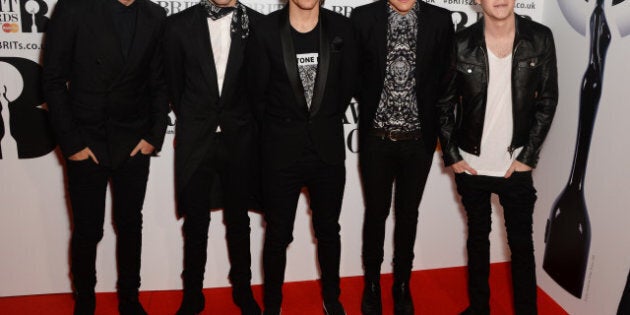 LONDON, ENGLAND - FEBRUARY 19: Zayn Malik, Harry Styles, Louis Tomlinson, Liam Payne and Niall Horan of One Direction attend The BRIT Awards 2014 at The O2 Arena on February 19, 2014 in London, England. (Photo by Dave J Hogan/Getty Images)