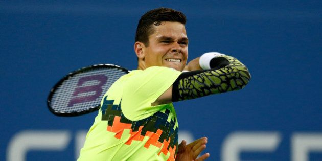 NEW YORK, NY - SEPTEMBER 01: Milos Raonic of Canada in action against Kei Nishikori of Japan on Day Eight of the 2014 US Open at the USTA Billie Jean King National Tennis Center on September 1, 2014 in the Flushing neighborhood of the Queens borough of New York City. (Photo by Julian Finney/Getty Images)