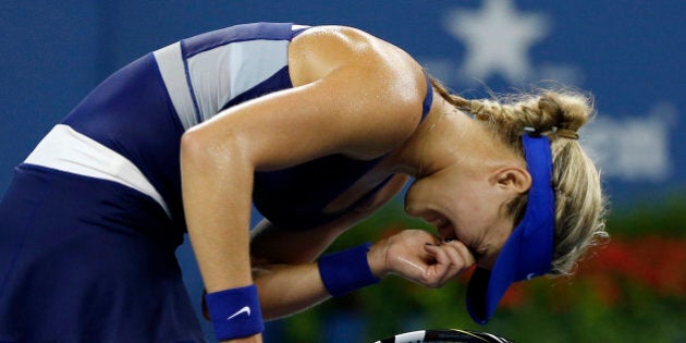 Eugenie Bouchard, of Canada, reacts after losing a point against Barbora Zahlavova Strycova, of the Czech Republic, during the third round of the U.S. Open tennis tournament Saturday, Aug. 30, 2014, in New York. (AP Photo/Elise Amendola)